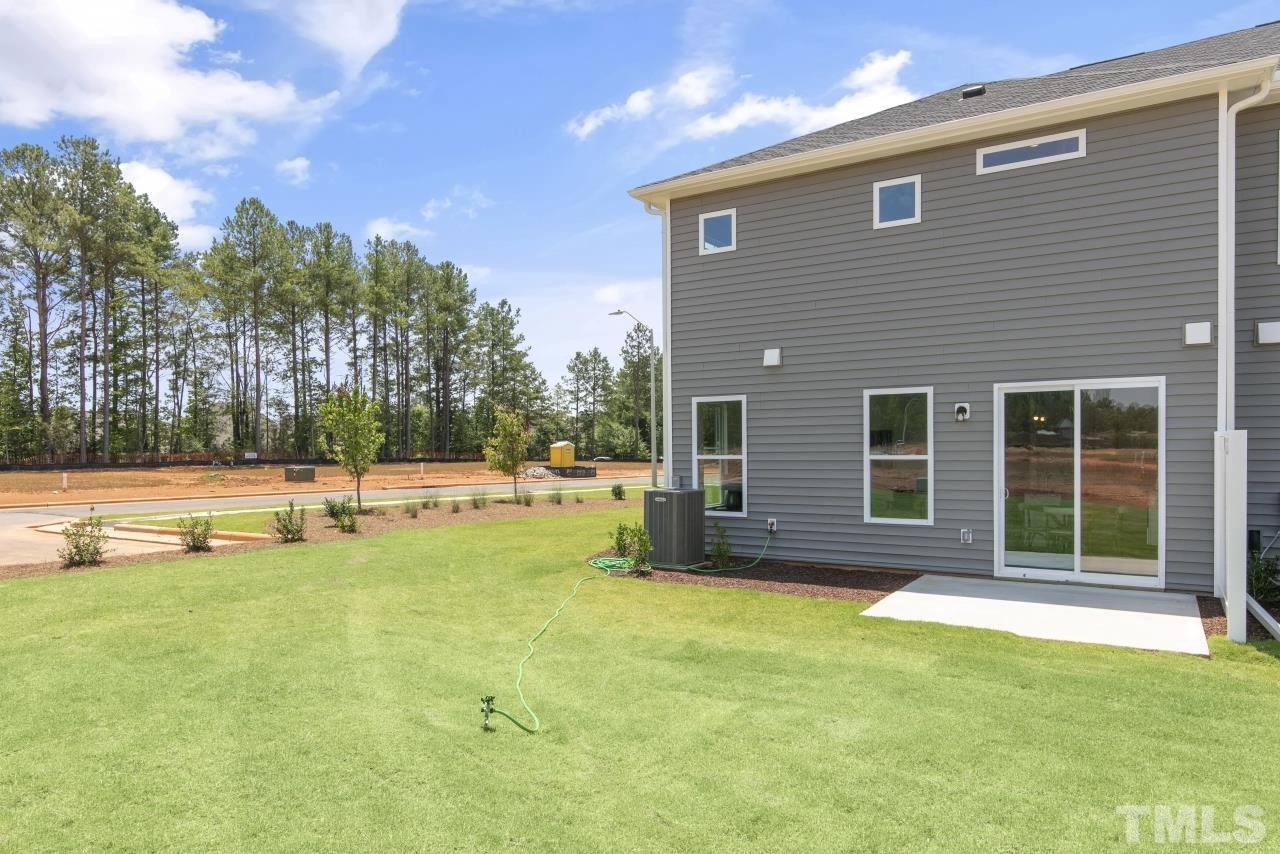 196 Lennei Lane Garner, NC 27529 - Photo 43 of 46 a view of swimming pool with palm trees