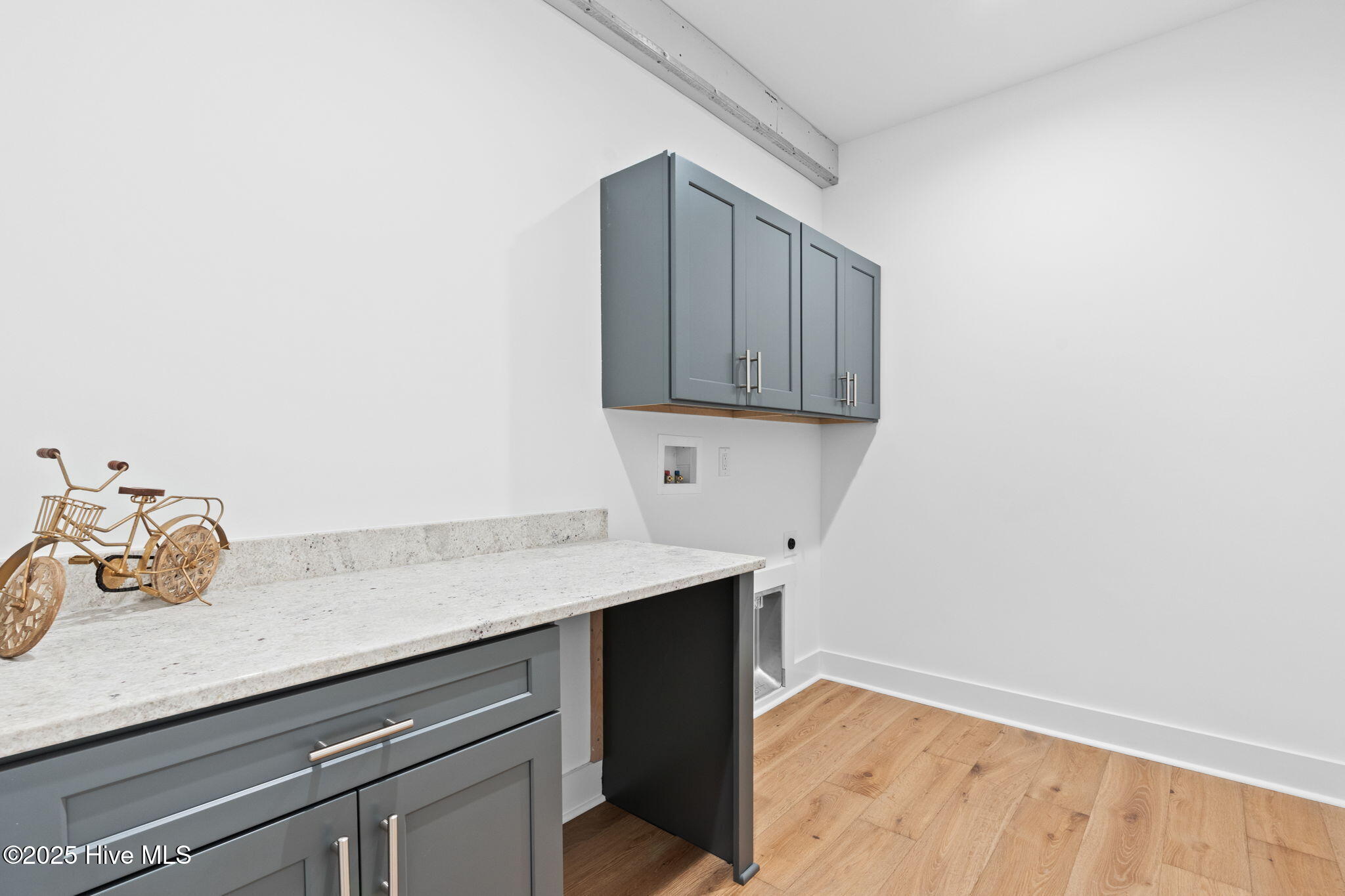 519 Genoe's Point Road Southwest Supply, NC 28462 - Photo 44 of 87 Laundry room with leathered natural stone countertop