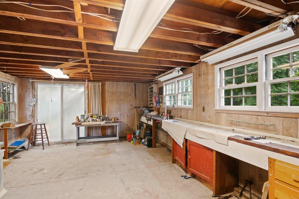 2216 Boston Post Road Darien, CT 06820 - Photo 15 of 31 a large white kitchen with stainless steel appliances granite countertop a sink stove and cabinets