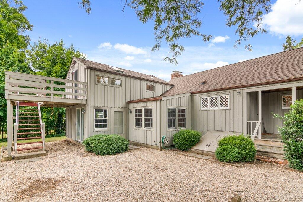 2216 Boston Post Road Darien, CT 06820 - Photo 21 of 31 front view of a house with a small yard