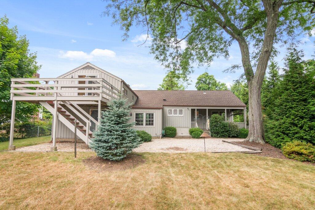 2216 Boston Post Road Darien, CT 06820 - Photo 22 of 31 front view of a house with a yard