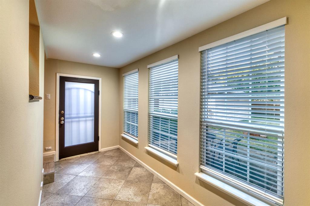 314 Easton Road Dallas, TX 75218 - Photo 22 of 26 a view of livingroom with window