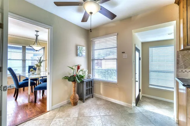 a view of a livingroom with furniture window and wooden floor