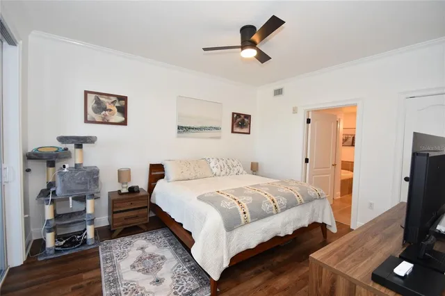 a bathroom with a tub a sink and a mirror
