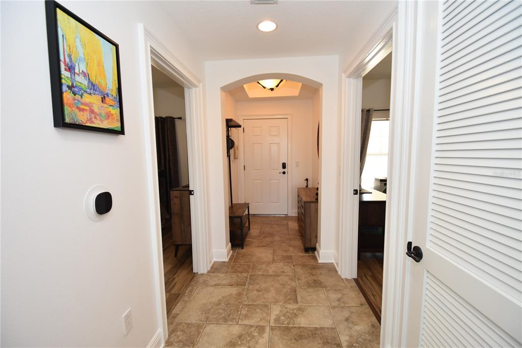 146 Palm Coast Resort Boulevard, Unit 404 Palm Coast, FL 32137 - Photo 3 of 43 a view of a hallway with interior of the house