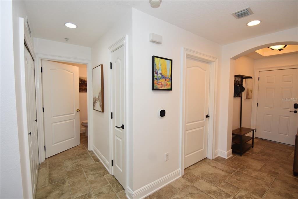 146 Palm Coast Resort Boulevard, Unit 404 Palm Coast, FL 32137 - Photo 32 of 43 a view of a hallway with closet and a bathroom