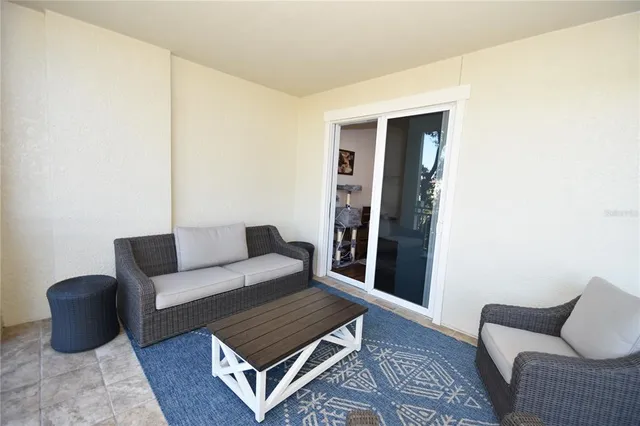 a living room with furniture and a couch