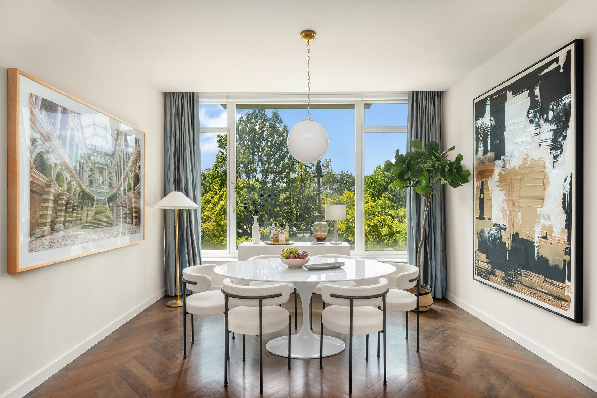 a view of a dining room with furniture window and outside view