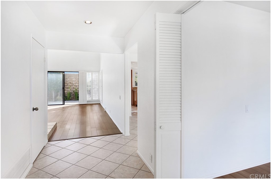 23892 Danzig Bay Dana Point, CA 92629 - Photo 14 of 49 a view of an entryway with wooden floor