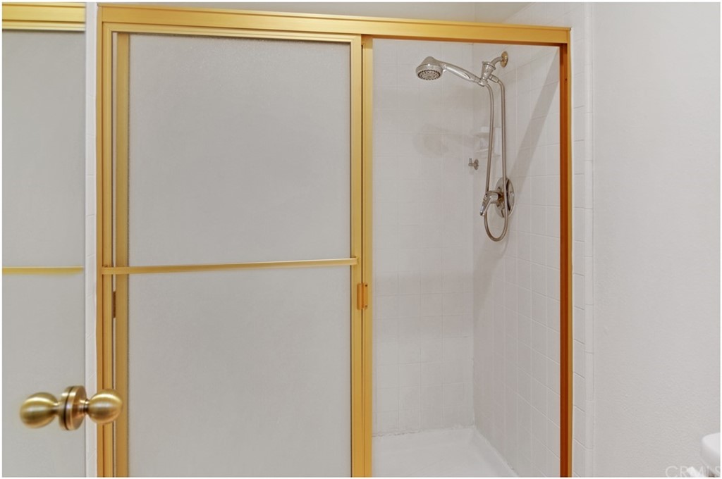 23892 Danzig Bay Dana Point, CA 92629 - Photo 28 of 49 a bathroom with a shower