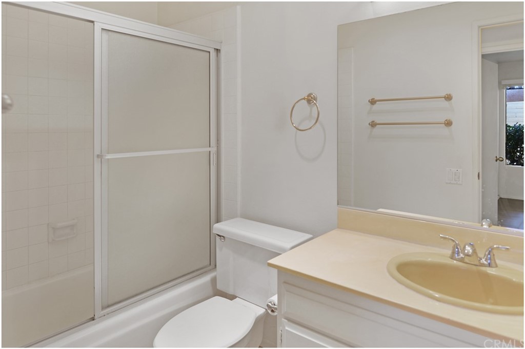23892 Danzig Bay Dana Point, CA 92629 - Photo 31 of 49 a bathroom with a sink a toilet and shower