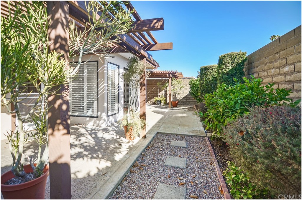 23892 Danzig Bay Dana Point, CA 92629 - Photo 37 of 49 a pathway of a house with a yard