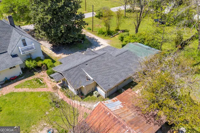 a view of a livingroom with furniture and a fireplace