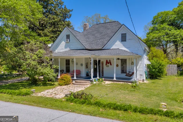 a view of a house with garden