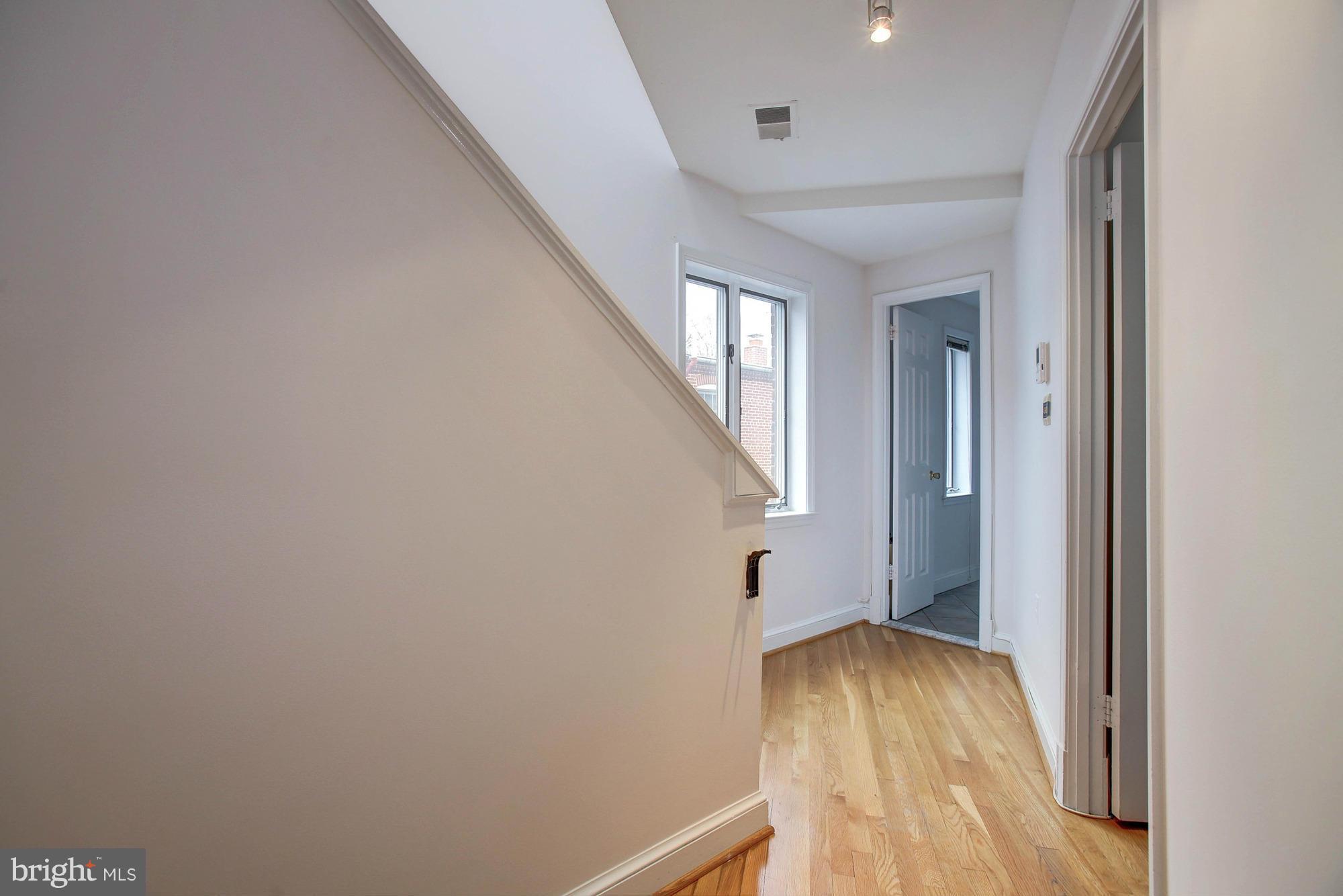 1607 T Street Northwest, Unit A Washington, DC 20009 - Photo 17 of 30 Landing, upper level 1