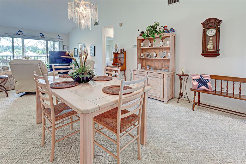 418 Cerromar Court, Unit 261 Venice, FL 34293 - Photo 25 of 76 a view of a dining room with furniture