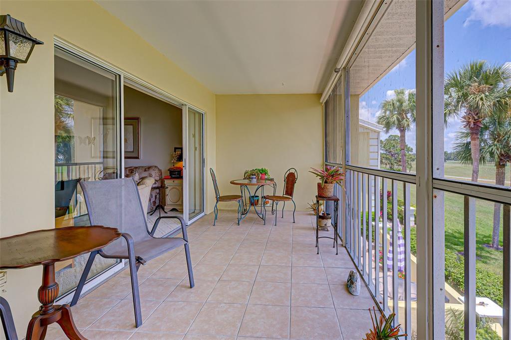 418 Cerromar Court, Unit 261 Venice, FL 34293 - Photo 38 of 76 a view of two chairs in the balcony