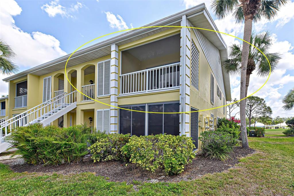 418 Cerromar Court, Unit 261 Venice, FL 34293 - Photo 4 of 76 a front view of a house with a garden