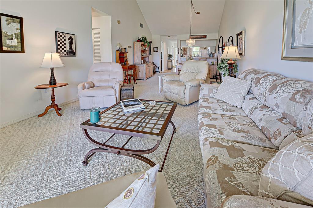 418 Cerromar Court, Unit 261 Venice, FL 34293 - Photo 41 of 76 a living room with furniture and a rug