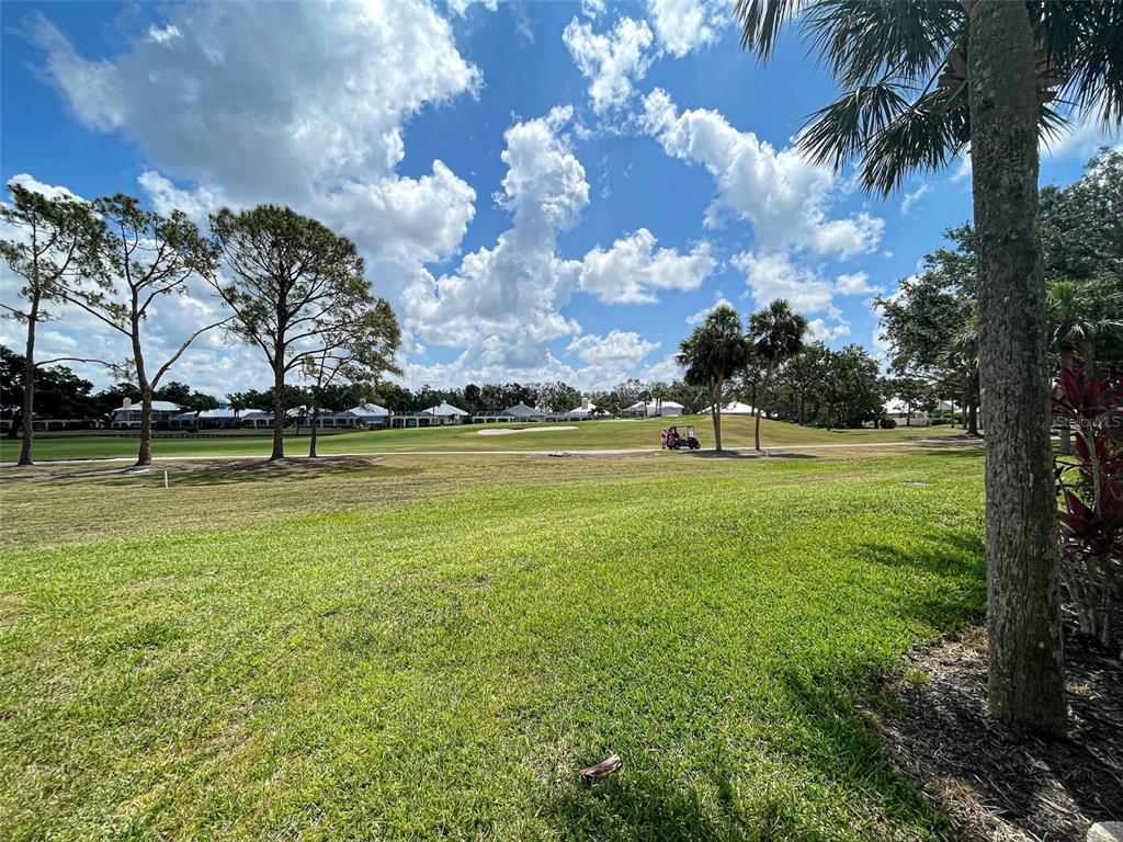 418 Cerromar Court, Unit 261 Venice, FL 34293 - Photo 47 of 76 a view of a swimming pool with an outdoor space and seating area