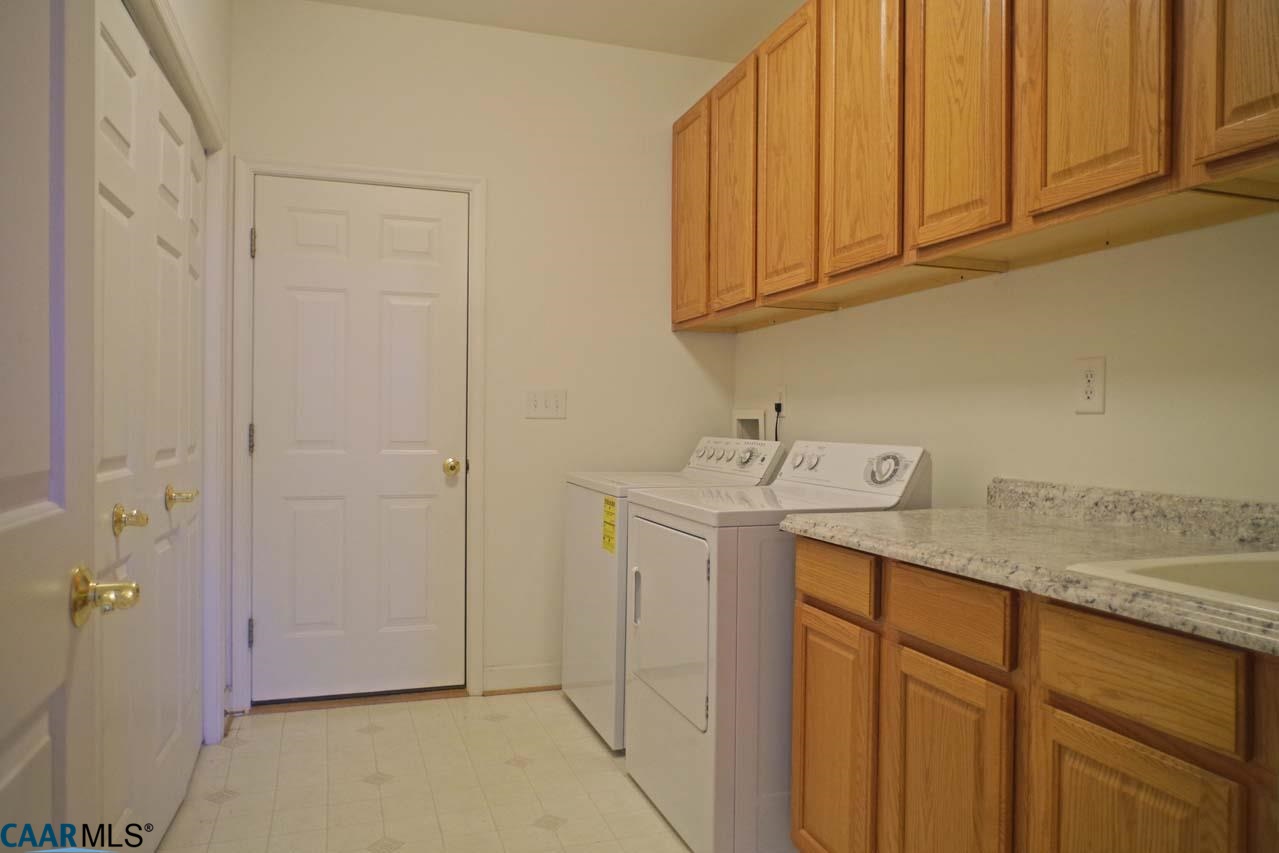 2126 Shepherds Ridge Road Charlottesville, VA 22901 - Photo 12 of 37 a utility room with a sink