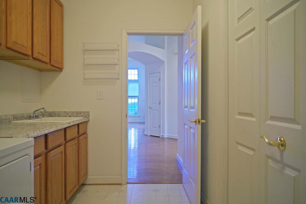 2126 Shepherds Ridge Road Charlottesville, VA 22901 - Photo 13 of 37 a bathroom with a granite countertop sink and a mirror