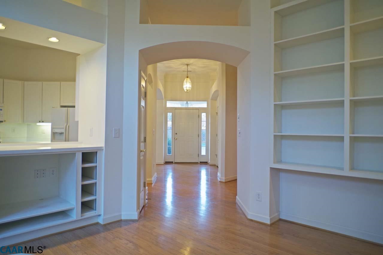 2126 Shepherds Ridge Road Charlottesville, VA 22901 - Photo 14 of 37 a view of a hallway with wooden floor closet and windows