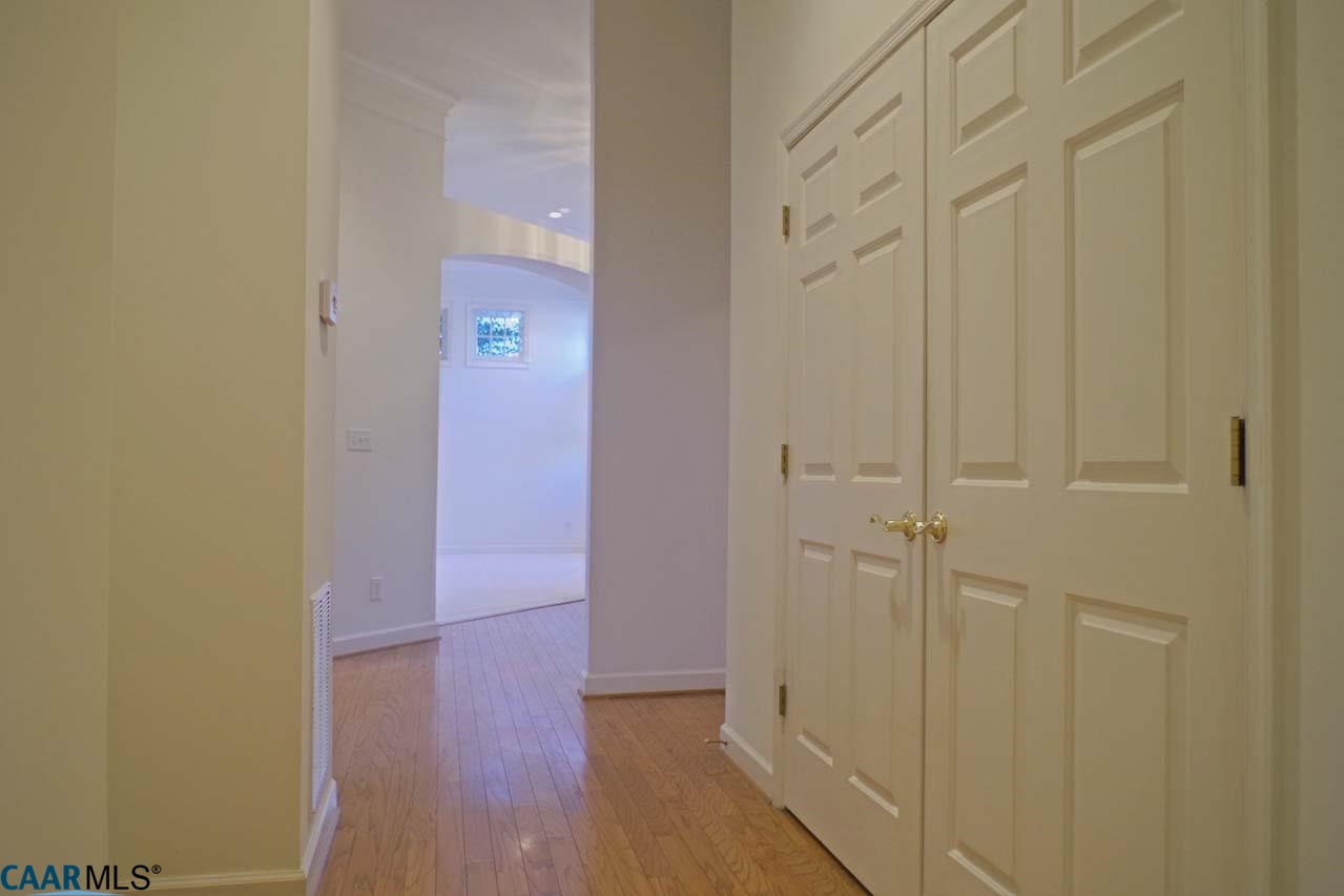2126 Shepherds Ridge Road Charlottesville, VA 22901 - Photo 27 of 37 a view of a hallway with wooden floor
