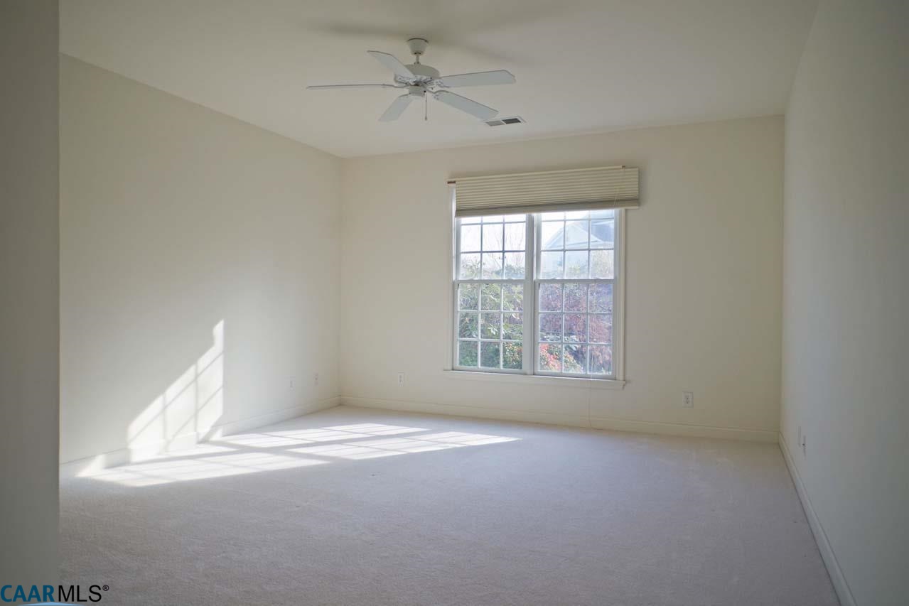 2126 Shepherds Ridge Road Charlottesville, VA 22901 - Photo 28 of 37 an empty room with a empty space and windows