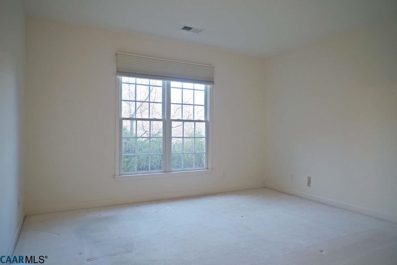 2126 Shepherds Ridge Road Charlottesville, VA 22901 - Photo 34 of 37 an empty room with a window