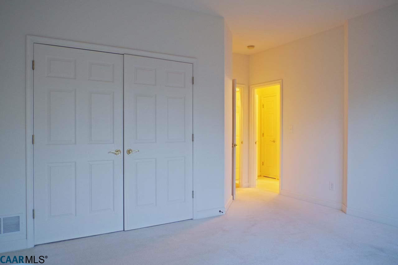 2126 Shepherds Ridge Road Charlottesville, VA 22901 - Photo 35 of 37 a view of an empty room with a window