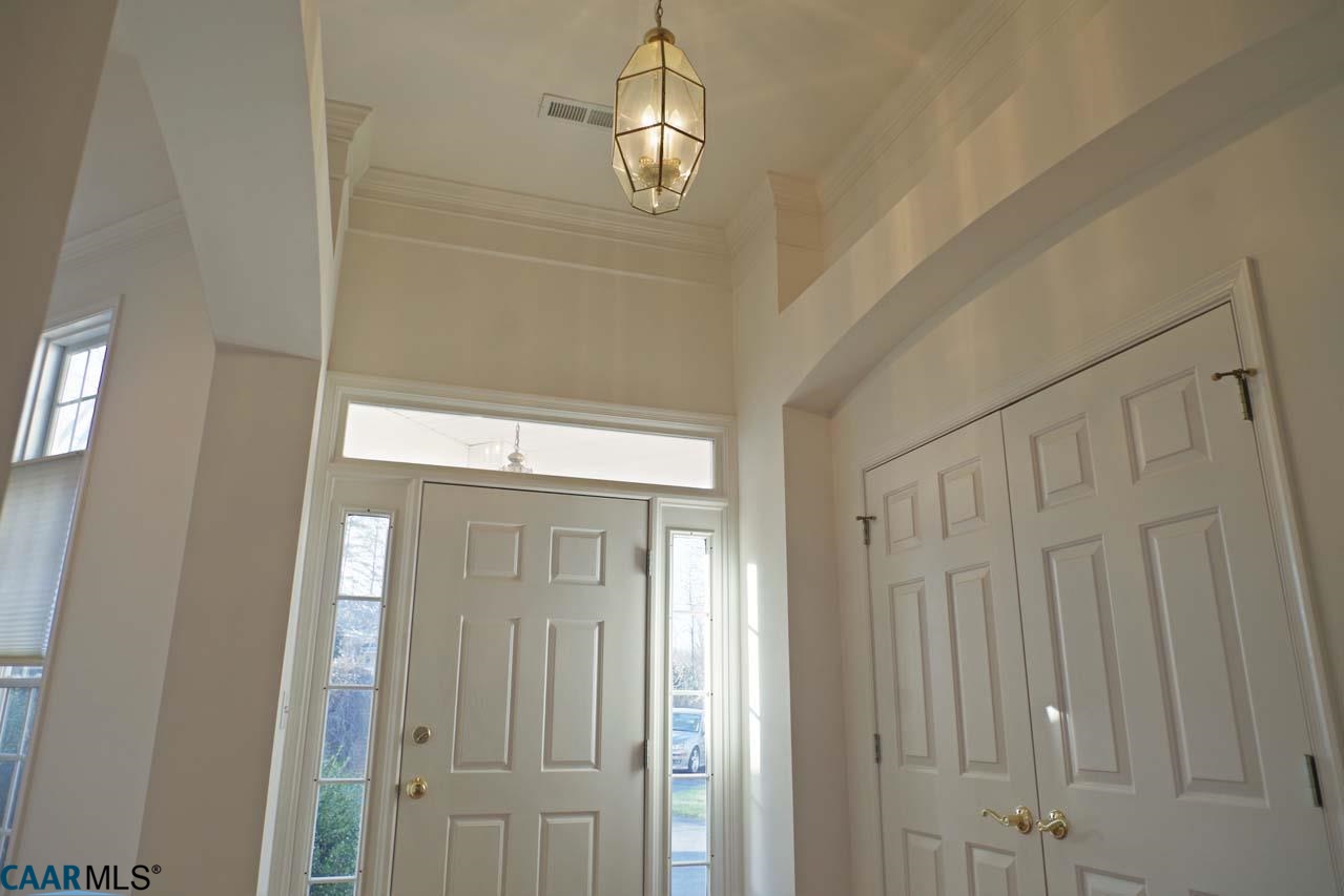 2126 Shepherds Ridge Road Charlottesville, VA 22901 - Photo 4 of 37 a view of a hallway with windows