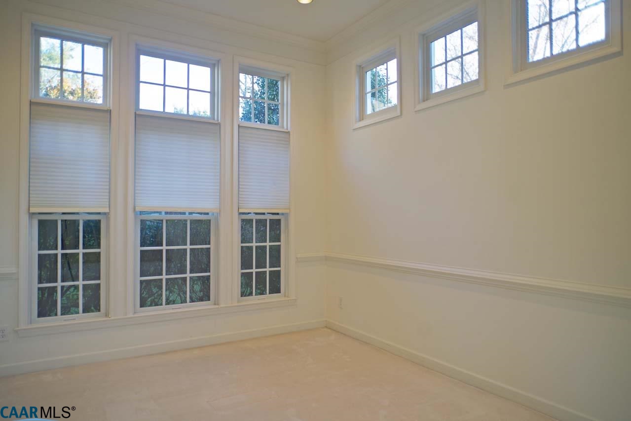 2126 Shepherds Ridge Road Charlottesville, VA 22901 - Photo 10 of 37 an empty room with windows