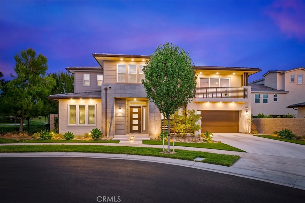 52 Bolide Irvine, CA 92618 - Photo 1 of 1 a front view of a house with a yard and garage