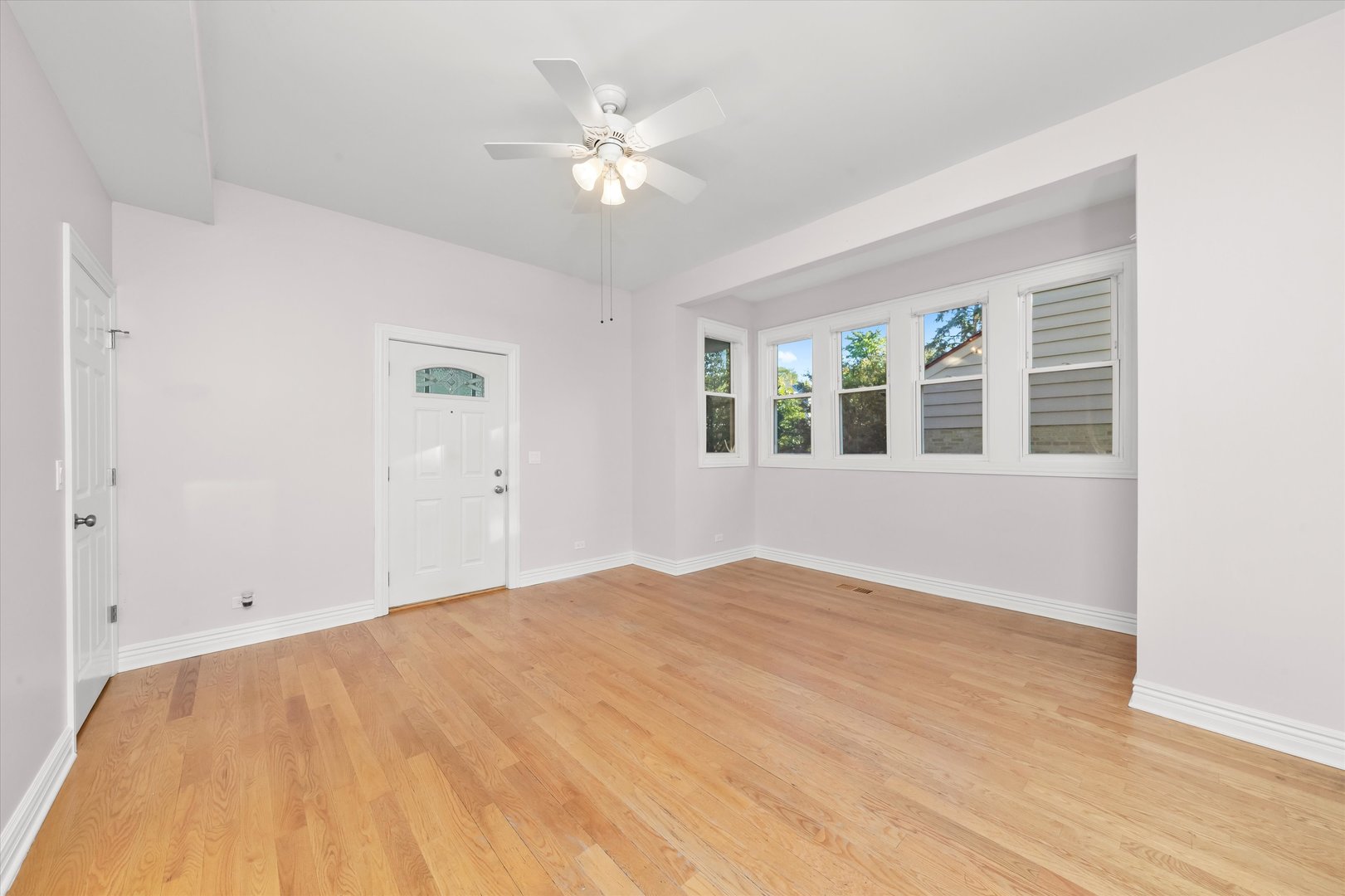 197 Herrick Road Riverside, IL 60546 - Photo 7 of 45 a view of an empty room with a window