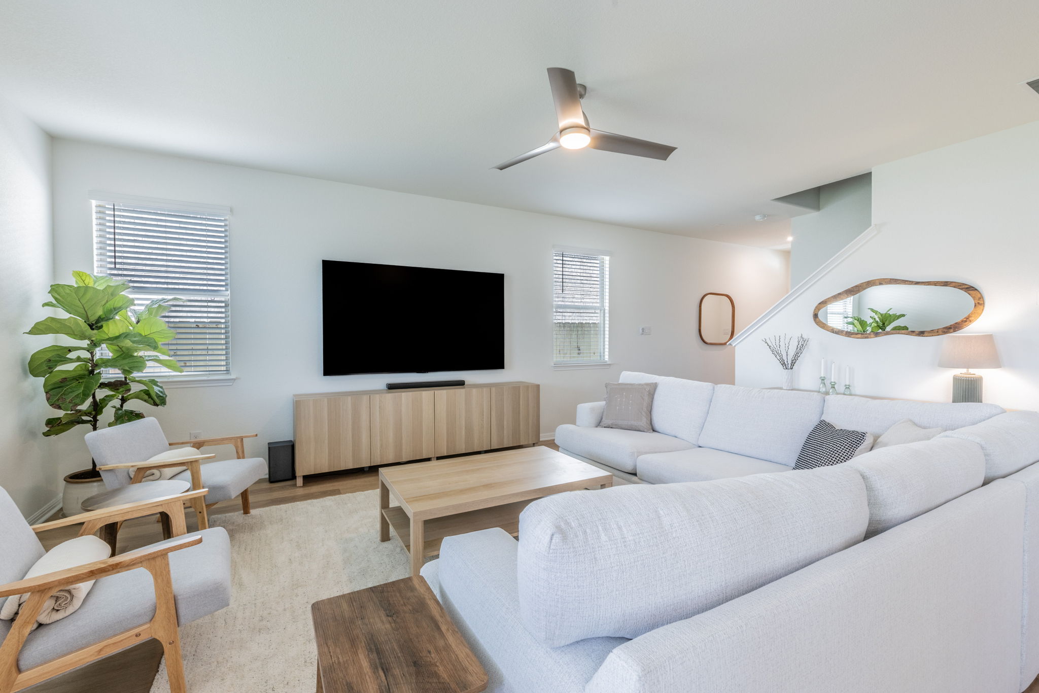 593 Backstays Loop Kyle, TX 78640 - Photo 4 of 26 a living room with furniture and a flat screen tv