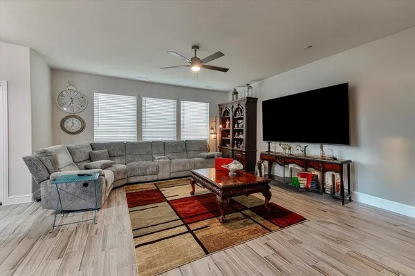 a kitchen that has a cabinets counter space dining table and a window