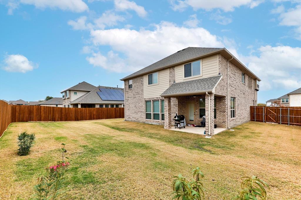 10 Covey Lane Sanger, TX 76266 - Photo 25 of 29 a view of a house with snow in the background