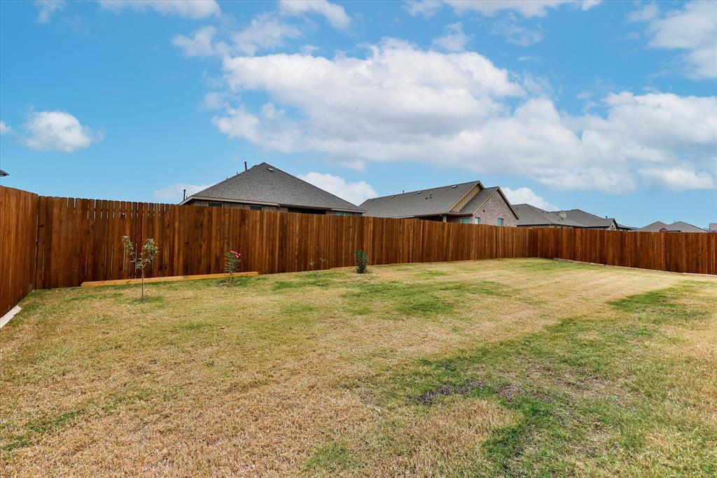 10 Covey Lane Sanger, TX 76266 - Photo 26 of 29 a swimming pool with wooden fence
