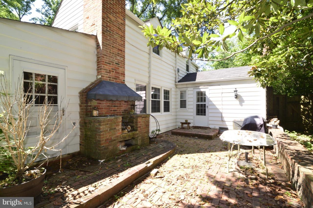 3073 Holmes Run Road Falls Church, VA 22042 - Photo 26 of 29 Patio parties with a built-in brick barbecue.