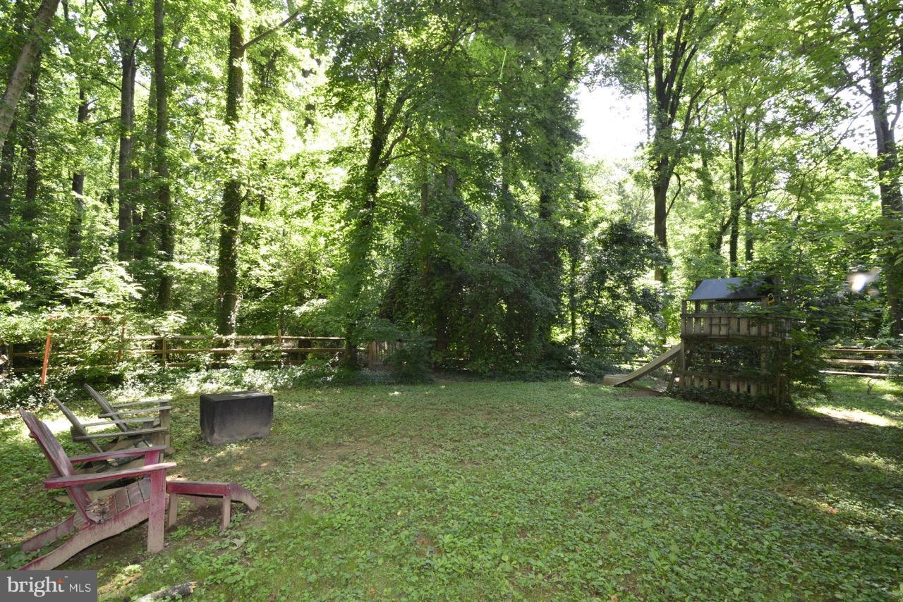 3073 Holmes Run Road Falls Church, VA 22042 - Photo 28 of 29 Fully fenced dog run, playground & firepit.