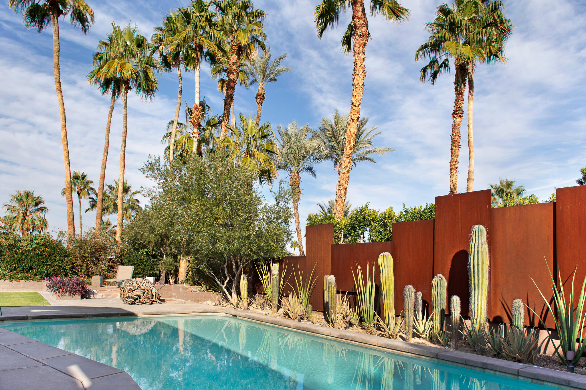 73580 Broken Arrow Trail Palm Desert, CA 92260 - Photo 12 of 40 a view of a house with outdoor space and sitting area