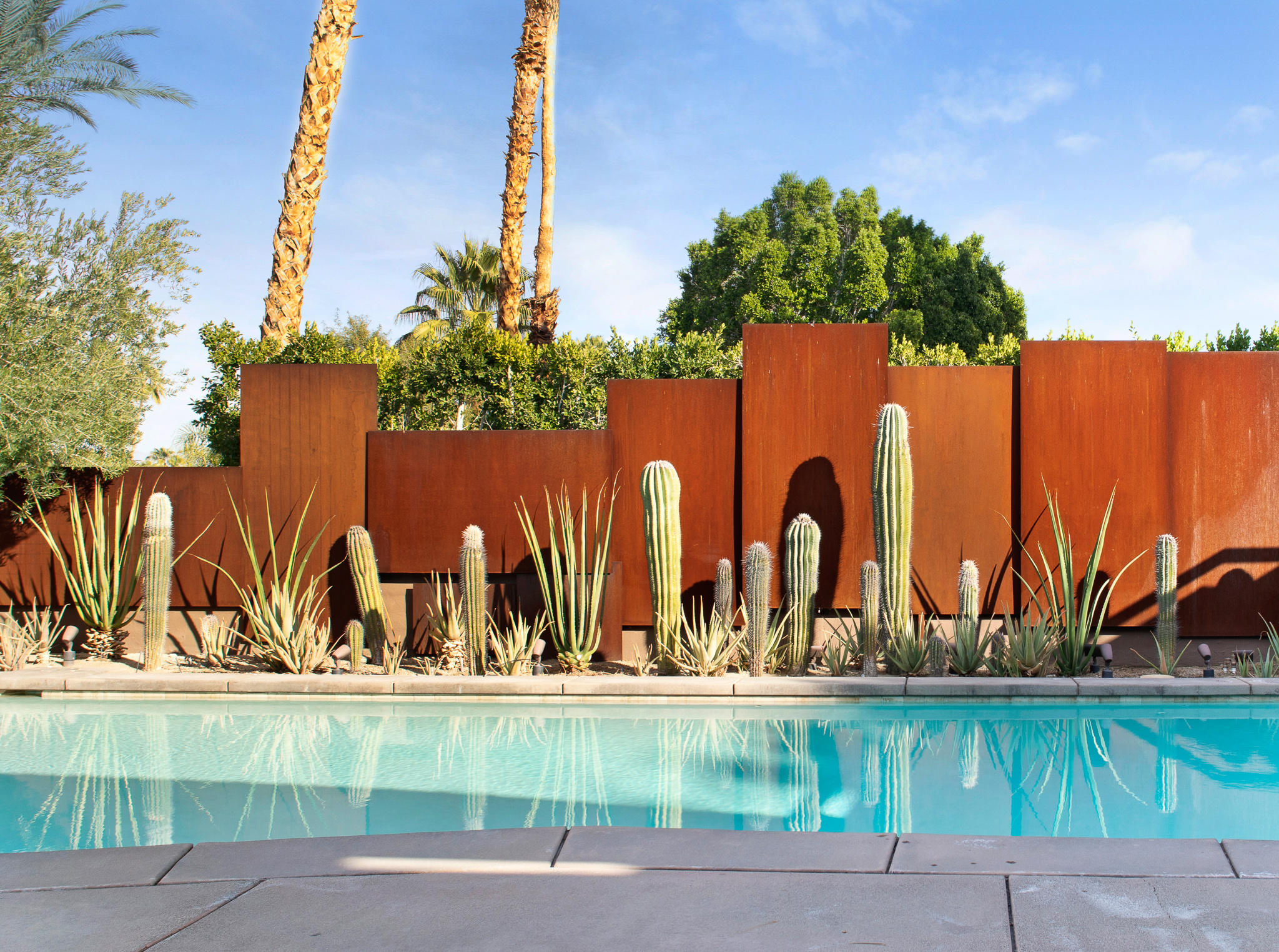 73580 Broken Arrow Trail Palm Desert, CA 92260 - Photo 13 of 40 a view of swimming pool with outdoor seating