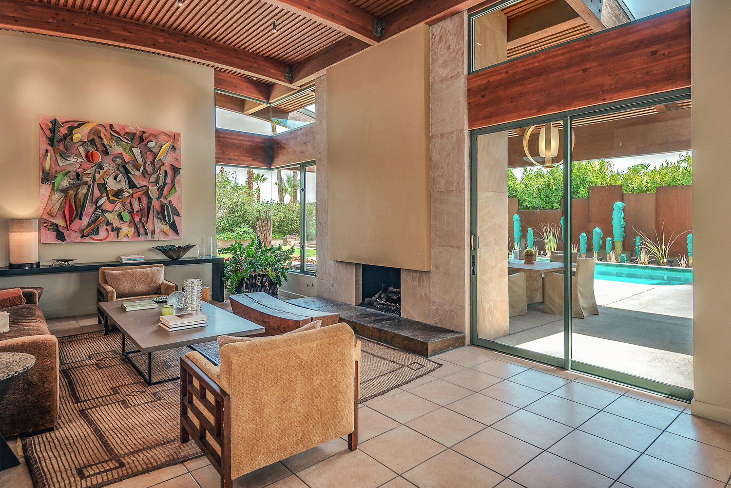 73580 Broken Arrow Trail Palm Desert, CA 92260 - Photo 18 of 40 a outdoor space with patio the couches and a dining table with the garden view