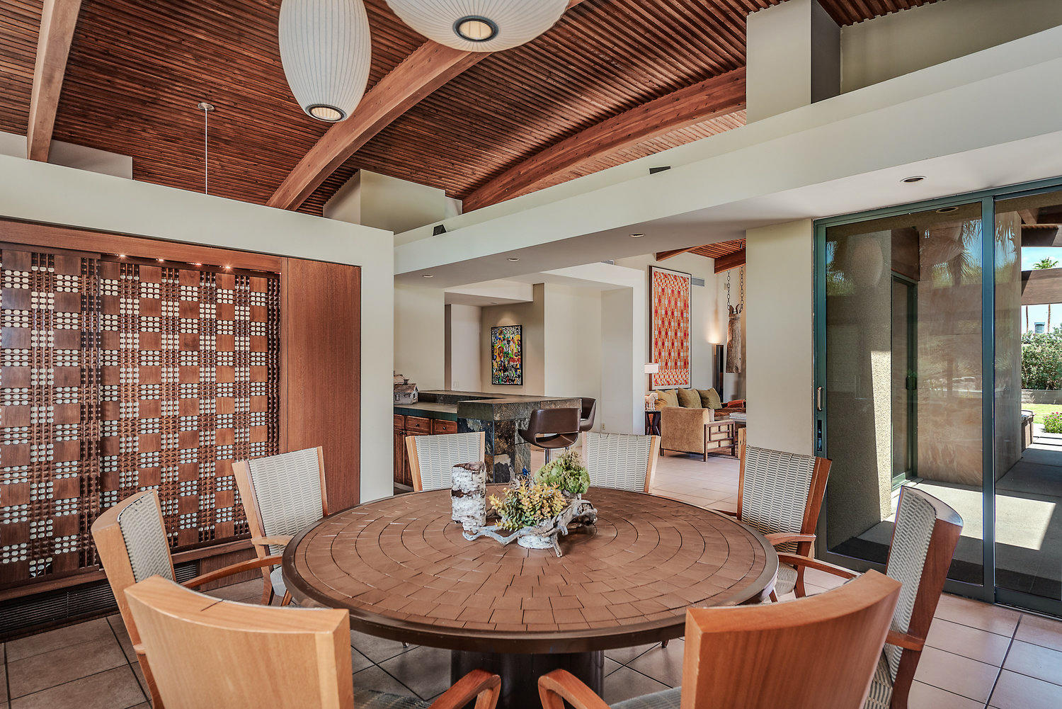 73580 Broken Arrow Trail Palm Desert, CA 92260 - Photo 20 of 40 a view of a dining room with furniture
