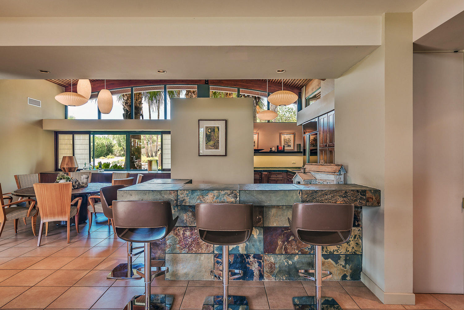 73580 Broken Arrow Trail Palm Desert, CA 92260 - Photo 24 of 40 a kitchen with a table and chairs in it