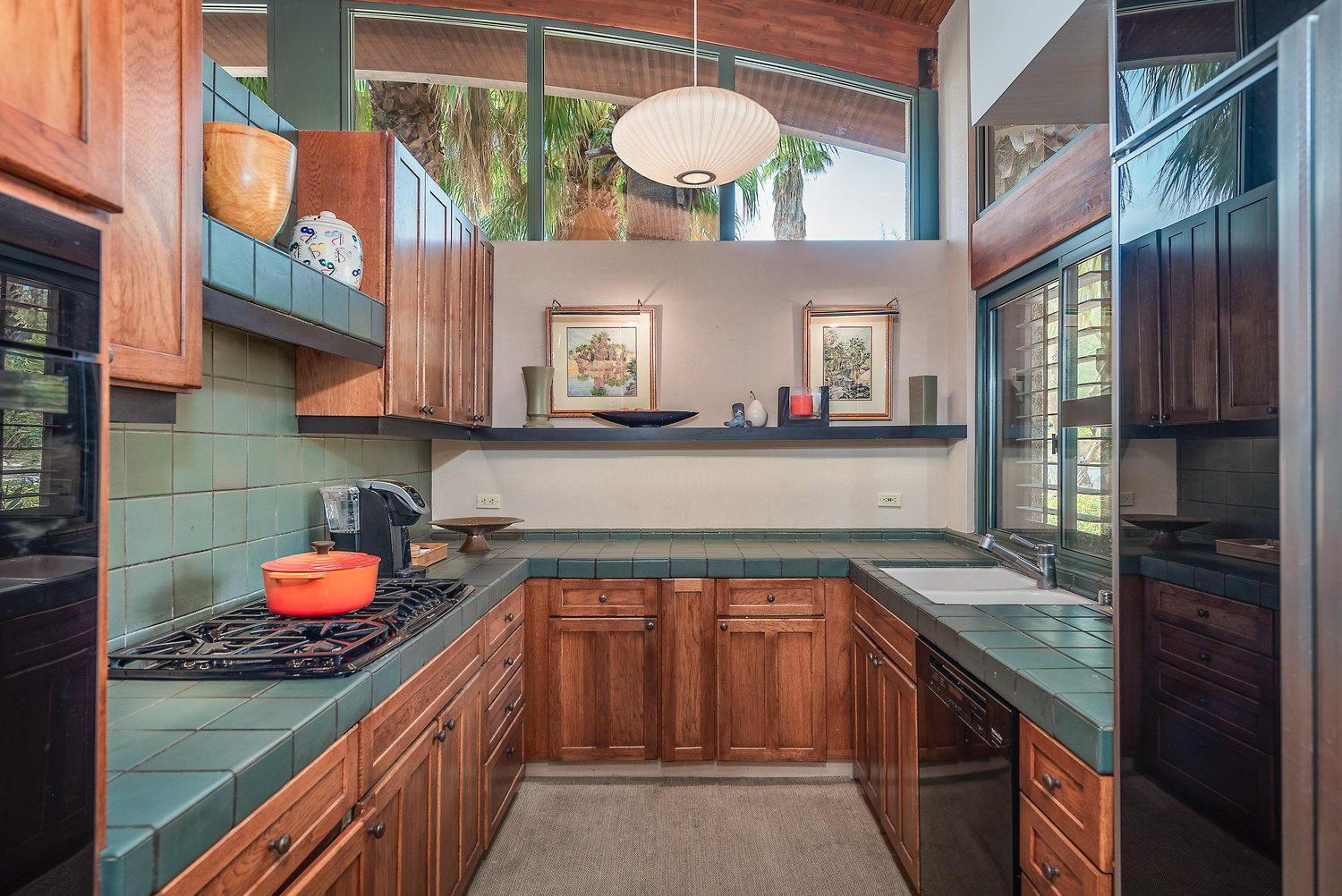 73580 Broken Arrow Trail Palm Desert, CA 92260 - Photo 25 of 40 a kitchen with stainless steel appliances granite countertop a stove and a sink