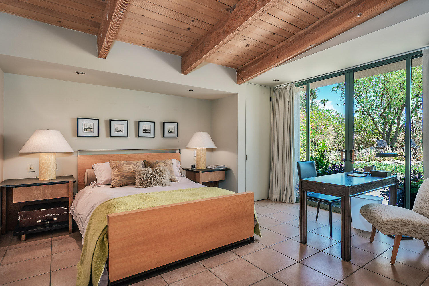 73580 Broken Arrow Trail Palm Desert, CA 92260 - Photo 26 of 40 a bed room with a bed and a table