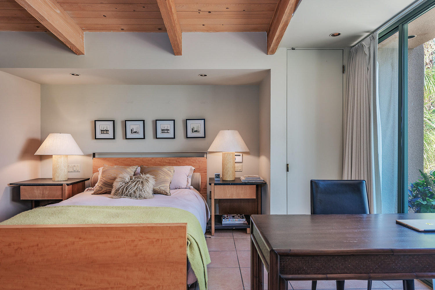 73580 Broken Arrow Trail Palm Desert, CA 92260 - Photo 28 of 40 a bedroom with a bed and a table