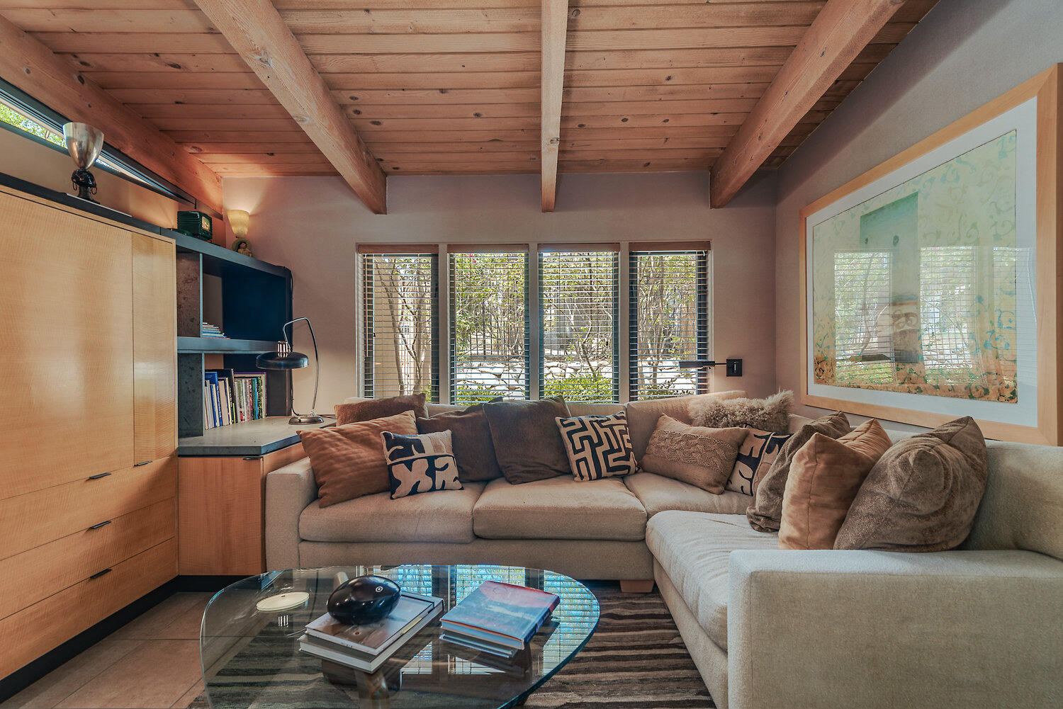 73580 Broken Arrow Trail Palm Desert, CA 92260 - Photo 32 of 40 a living room with furniture a flat screen tv and windows